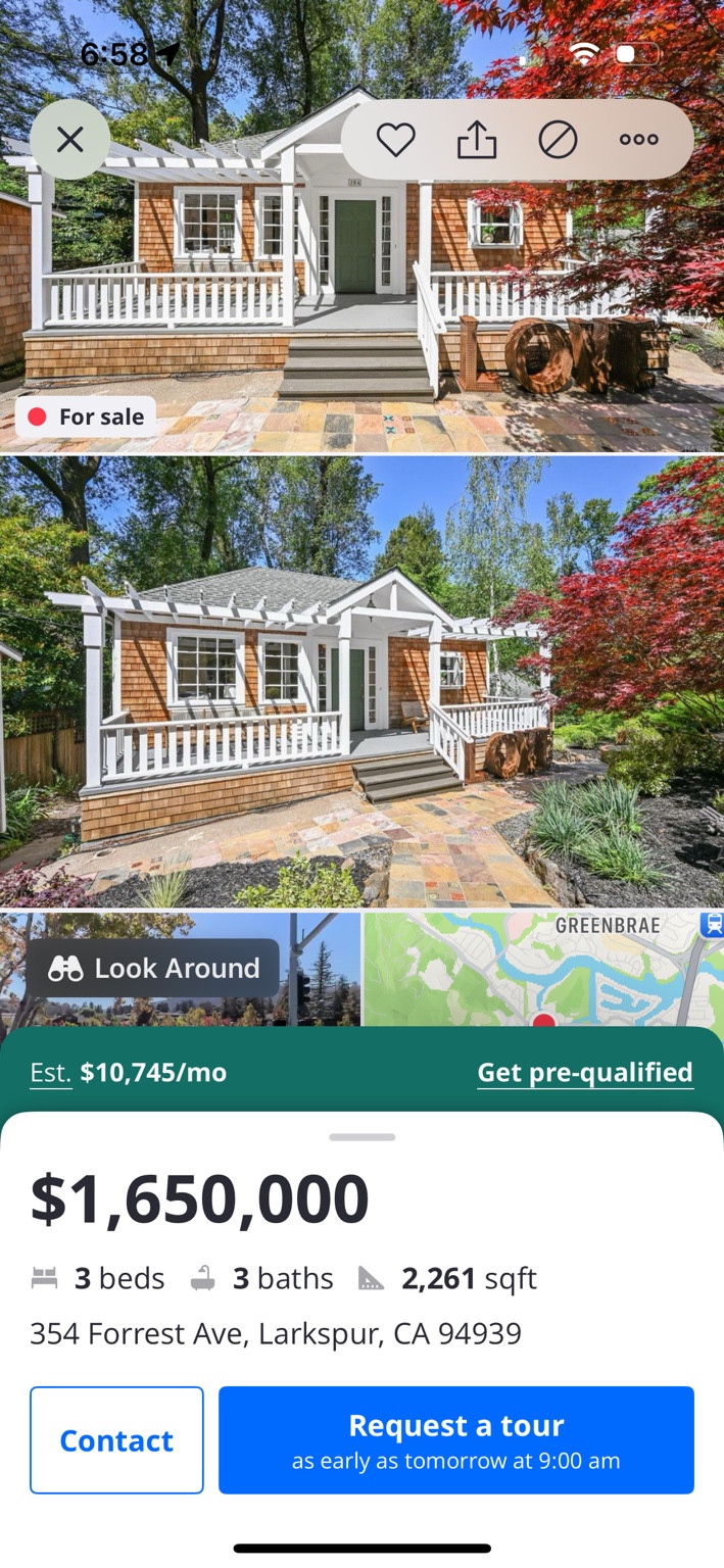 Listing screenshot showing a shingled house with white trim and an entry pergola.